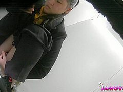 Hairly Asian teen pussy captured peeing