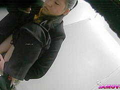 Hairly Asian teen pussy captured peeing