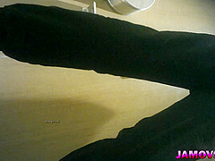 An Asian prostitute dressed in all black is caught on a hidden camera.