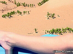 Cleo Dream strips naked outdoors on her towel