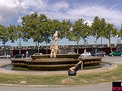 Public deepthroating BDSM slut sucks 2 cocks outdoor