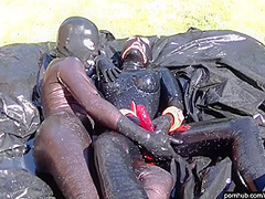 Two Latex Lesbian Bitches Enjoy The Hot Summer Outdoor With Dildo Games On Her Rubber Playground