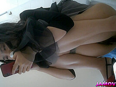 asian teen pissing in toilet