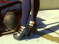 HJ busty domina with big boobs jerking black cock outdoor