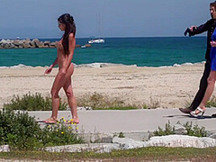 Scandalous slut walks naked outdoor in front of people