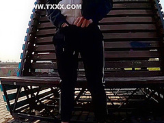 Guy Masturbates On The Promenade In The City Center