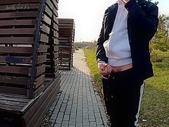 Guy Masturbates On The Promenade In The City Center