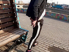 Guy Masturbates On The Promenade In The City Center