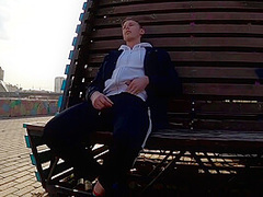 Guy Masturbates On The Promenade In The City Center