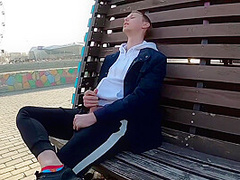 Guy Masturbates On The Promenade In The City Center