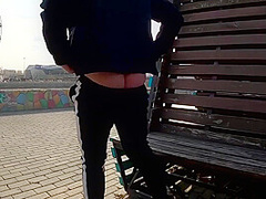 Guy Masturbates On The Promenade In The City Center