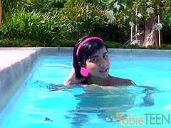 Tobie teen masturbating outdoors by the pool