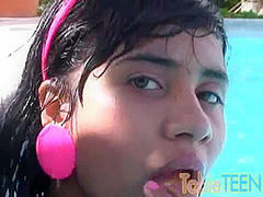 Tobie teen masturbating outdoors by the pool