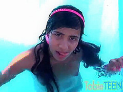 Tobie teen masturbating outdoors by the pool