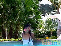 Tobie teen masturbating outdoors by the pool