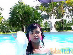 Tobie teen masturbating outdoors by the pool