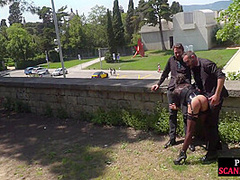 Public babe deepthroating outdoor while spanked in 3some