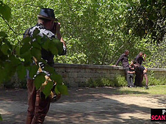 Public babe deepthroating outdoor while spanked in 3some