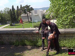 Public babe deepthroating outdoor while spanked in 3some