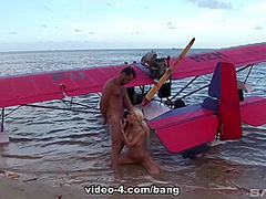 Caylian curtis fucks a pilot on a secluded island beach - BANG