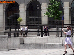 Public BDSM babe deepthroats hard cock in front of voyeurs