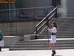 Public BDSM babe deepthroats hard cock in front of voyeurs
