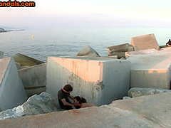 BDSM public slut deepthroats cock outdoor in front voyeurs