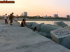 BDSM public slut deepthroats cock outdoor in front voyeurs