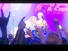 Girls flashing tits and topless on stage at rock concerts