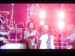 Girls flashing tits and topless on stage at rock concerts