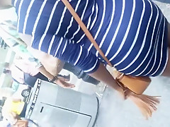 Short black woman with a bubble