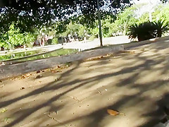 Cute brunette playing with pussy and dildo in public