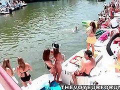 Group Of Party Girls Drinking And Dancing On A Boat