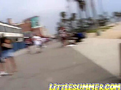 Petite teen masturbating on the beach