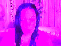 Brunnette flashing her boobs at the hot tub