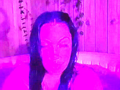 Brunnette flashing her boobs at the hot tub