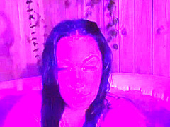 Brunnette flashing her boobs at the hot tub