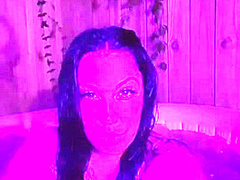 Brunnette flashing her boobs at the hot tub