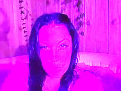 Brunnette flashing her boobs at the hot tub