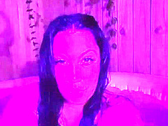 Brunnette flashing her boobs at the hot tub