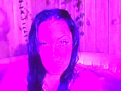 Brunnette flashing her boobs at the hot tub