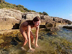 Rebeka Ruby Nude On A Beach Walking In The Water Searching For Interesting Shells
