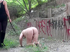 Outdoor walking with her pet by Femdom Austria