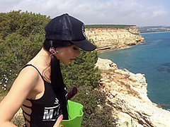 Before taking a tan a sexy girl fingers her pink hole on the beach by Real Agent