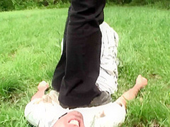 Outdoor trampling punishment with muddy shoes by Femdom Austria