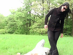 Outdoor trampling punishment with muddy shoes by Femdom Austria
