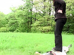 Outdoor trampling punishment with muddy shoes by Femdom Austria