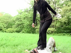 Outdoor trampling punishment with muddy shoes by Femdom Austria