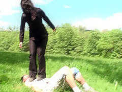 Outdoor trampling punishment with muddy shoes by Femdom Austria