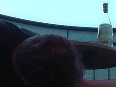 Sexy femdom smoking a cigarette while getting feet licked and toes sucked by Foot Girls